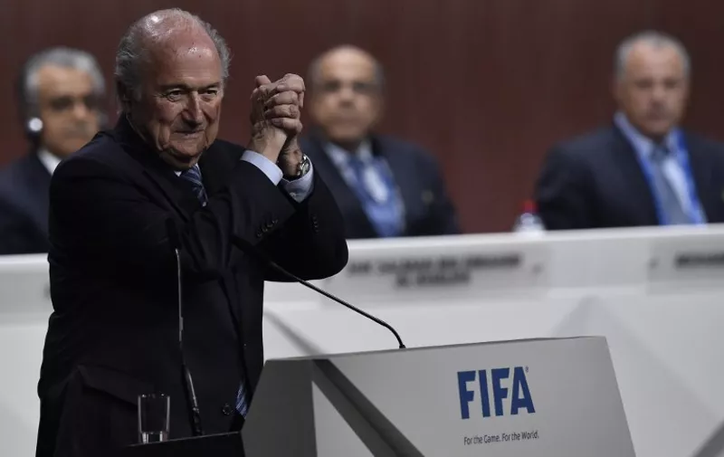FIFA President Sepp Blatter gestures after being re-elected following a vote to decide on the FIFA presidency in Zurich on May 29, 2015.     AFP PHOTO /  MICHAEL BUHOLZER