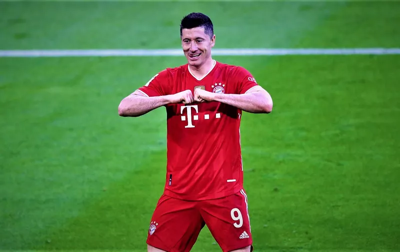 08 May 2021, Bavaria, Munich: Football: Bundesliga, FC Bayern M'nchen - Borussia M'nchengladbach, Matchday 32 at Allianz Arena. Munich's Robert Lewandowski celebrates his goal to make it 3:0. IMPORTANT NOTE: In accordance with the regulations of the DFL Deutsche Fu'ball Liga and the DFB Deutscher Fu'ball-Bund, it is prohibited to use or have used photographs taken in the stadium and/or of the match in the form of sequence pictures and/or video-like photo series. Photo by: Matthias Schrader/picture-alliance/dpa/AP Images