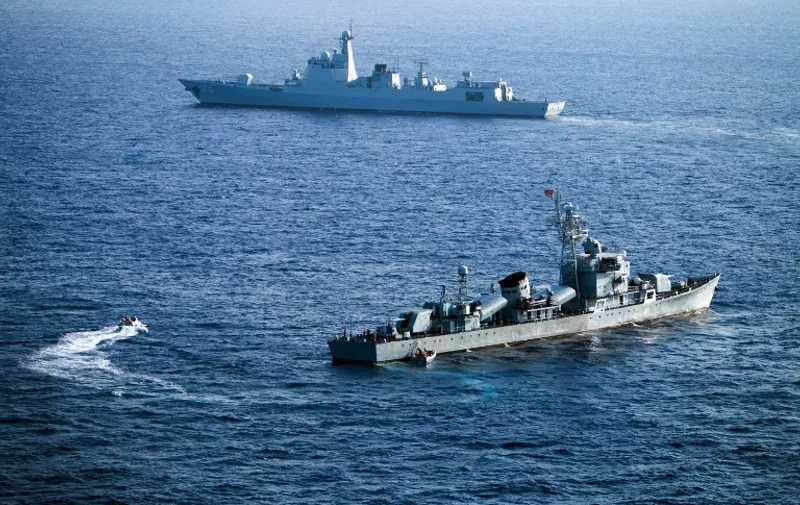(FILES) This file photo taken on May 5, 2016 shows crew members of China's South Sea Fleet taking part in a drill in the Xisha Islands, or the Paracel Islands in the South China Sea. 
China and Russia will hold joint naval exercises in the South China Sea in September, Beijing's defence ministry said on July 28, 2016, after an international tribunal invalidated the Asian giant's extensive claims in the area. / AFP PHOTO / STR