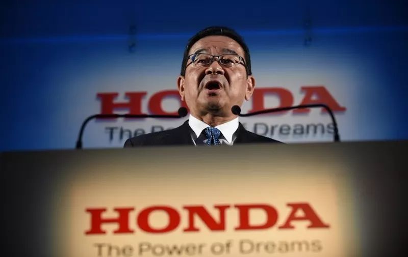 Honda Motor president Takahiro Hachigo speaks during a press conference in Tokyo on February 19, 2019. - Japanese car giant Honda said on February 19 it will shut its plant in Britain in 2021, a move that puts 3,500 jobs at risk and comes amid rising Brexit concerns. (Photo by Kazuhiro NOGI / AFP)