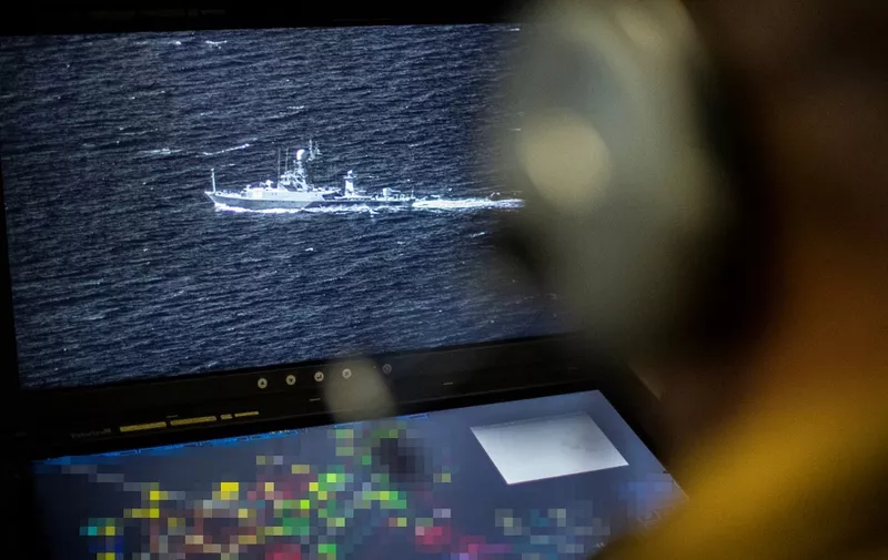 This photograph shows a Russian parchim class on a surveillance camera of the French navy patrol airplane Atlantique 2 on mission above the Baltic Sea on June 16, 2022. - The aim of the maritime patrol vessel's mission is "to locate vessels of Russian interest". (Photo by FRED TANNEAU / AFP)