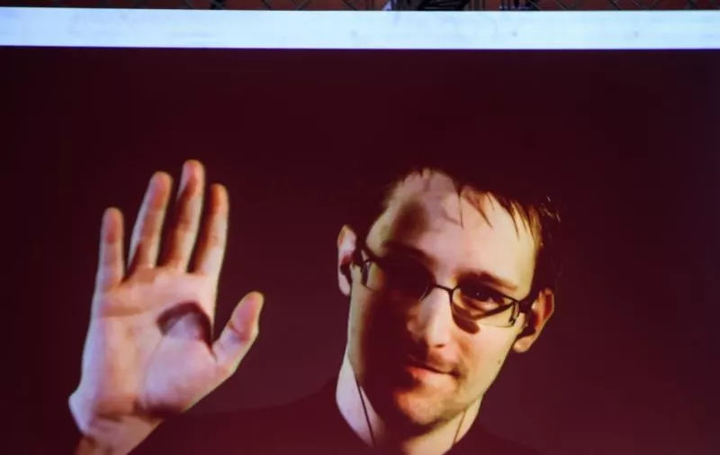 GERMANY-HANOVER-CEBIT 2015-EDWARD SNOWDEN(150318) -- HANOVER, March 18, 2015 (Xinhua) -- Edward Snowden is seen on the screen during a live remote interview at CeBIT 2015, the world's top trade fair for information and communication technology, in Hanover, Germany, on March 18, 2015. (Xinhua/Zhang Fan)Zhang Fan Photo: XINHUA/PIXSELL