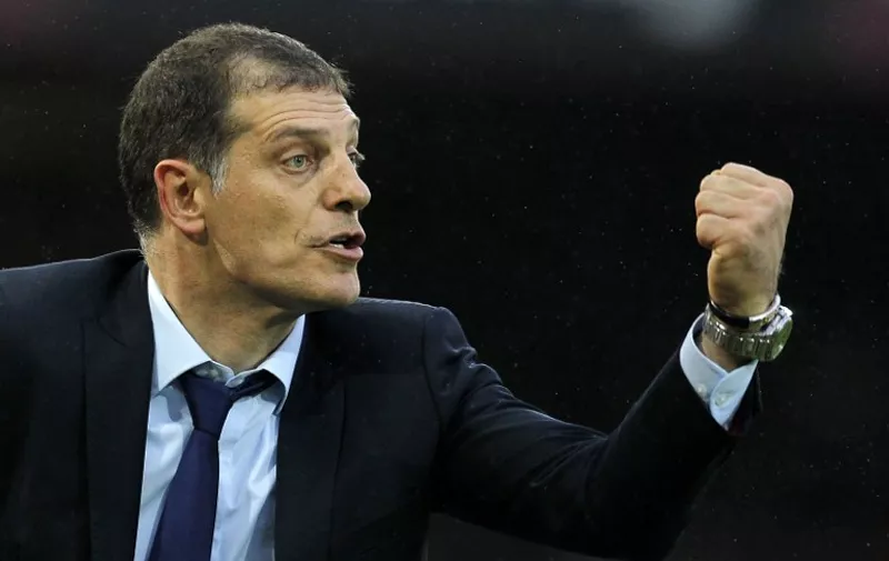 West Ham United's Croatian manager Slaven Bilic gestures during the English Premier League football match between West Ham United and Chelsea at The Boleyn Ground in Upton Park, east London on October 24, 2015. AFP PHOTO / IAN KINGTON

RESTRICTED TO EDITORIAL USE. No use with unauthorized audio, video, data, fixture lists, club/league logos or 'live' services. Online in-match use limited to 75 images, no video emulation. No use in betting, games or single club/league/player publications.