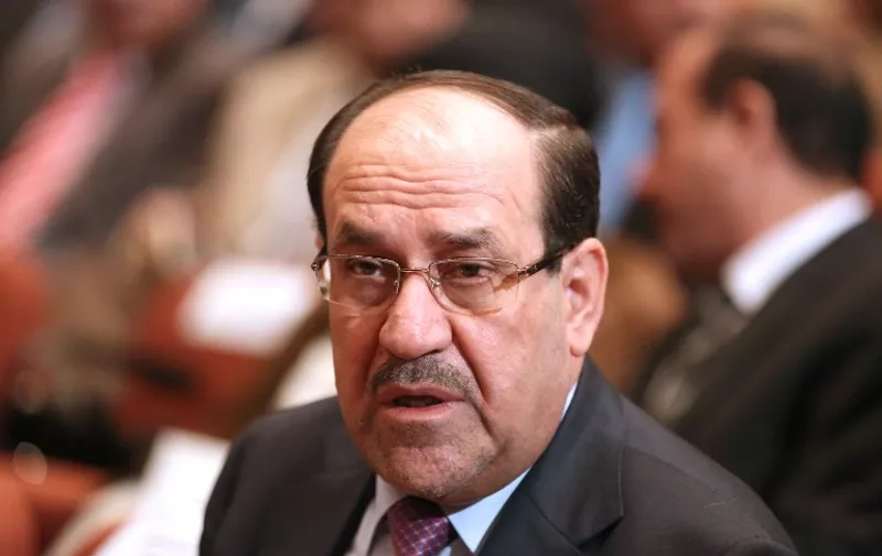 Iraq's Vice President Nuri al-Maliki attends a parliament session to aprrove the new government in Baghdad on September 8, 2014. Iraqi MPs approved a new cabinet but key security posts remained unfilled, as America's top diplomat prepared to visit the region to build a coalition against jihadists. AFP PHOTO / HADI MIZBAN / POOL / AFP / POOL / HADI MIZBAN