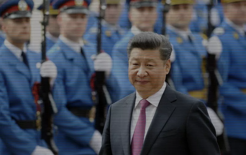 Chinese President Xi Jinping reviews the guards of honor upon his arrival in Belgrade on June, 18, 2016. 
Chinese President Xi Jinping holds official talks with Serbian counterpart Tomislav Nikolic and Prime Minister Aleksandar Vucic on June 18, 2016 during the second day of his three-day visit to Serbia, the first of its kind in more than 30 years.  / AFP PHOTO / OLIVER BUNIC