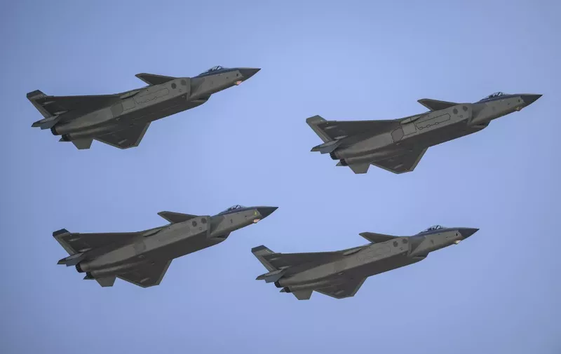 ZHUHAI,CHINA - NOVEMBER 10: J-20 stealth fighter jets perform in the sky during the 2022 Airshow on November 10, 2022 in Zhuhai, Guangdong province of China. The 14th Airshow China will be held from Nov. 8 to 13. Stringer / Anadolu Agency (Photo by STRINGER / ANADOLU AGENCY / Anadolu Agency via AFP)