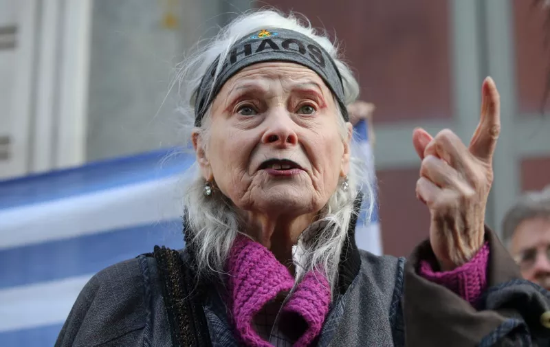 British designer Vivienne Westwood gestures during a protest action to highlight the exploitation of the West Papua rainforest and the continued presence of BP in the area, outside the headquarters of BP in London, on October 18, 2019. (Photo by ISABEL INFANTES / AFP)