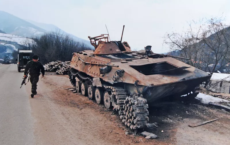 A blown up tank on the road to Mrkonjic Grad Photograph by Simon Dack 1996, Image: 98580494, License: Rights-managed, Restrictions: , Model Release: no, Credit line: Profimedia, Alamy