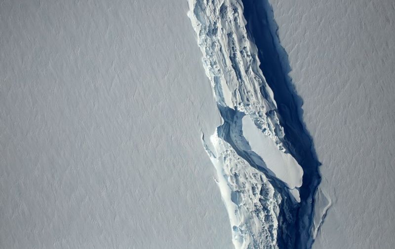 (FILES) This file photo taken on November 11, 2016 shows an image obtained from NASA showing the Antarctic Peninsula's rift in the Larsen C ice shelf from NASA's IceBridge mission Digital Mapping System. 
A trillion-tonne iceberg, one of the biggest on record, has snapped off the West Antarctic ice shelf, said scientists on July 12, 2017, who have monitored the growing crack for months. "The calving occurred sometime between Monday, July 10 and Wednesday, July 12, when a 5,800-square kilometre (2,200-square mile) section of Larsen C (ice shelf) finally broke away," the Swansea University said in a statement.

 / AFP PHOTO / NASA's Goddard Space Flight Center / HO / RESTRICTED TO EDITORIAL USE - MANDATORY CREDIT AFP PHOTO /NASA's Goddard Space Flight Center  - NO MARKETING - NO ADVERTISING CAMPAIGNS - DISTRIBUTED AS A SERVICE TO CLIENTS