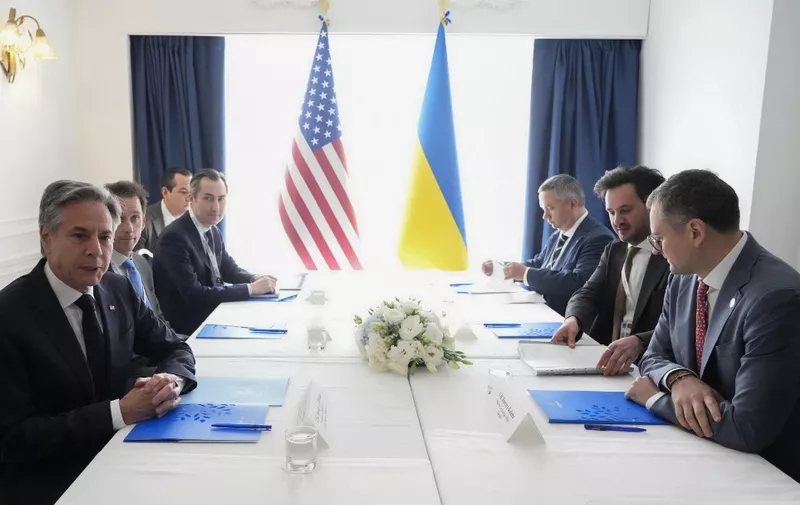 US Secretary of State Antony Blinken (L) and Ukraine's Foreign Minister Dmytro Kuleba (R) attend a bilateral meeting on the sidelines of the G7 Foreign Ministers meeting on Capri Island, April 18, 2024. (Photo by Gregorio Borgia / POOL / AFP)