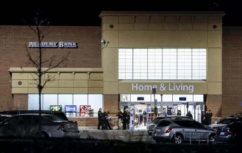 THORNTON, CO - NOVEMBER 1: Police investigate the scene of a shooting at a Wal Mart store in the Thorton Town Center shopping plaza on November 1, 2017 in Thornton, Colorado. According to reports, two people were killed and one was injured.   Marc Piscotty/Getty Images/AFP