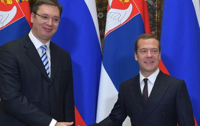 Russian Prime Minister Dmitry Medvedev (R) shakes hands with his Serbian counterpart Aleksandar Vucic during a meeting in Moscow on October 27, 2015. AFP PHOTO / RIA NOVOSTI / ALEXANDER ASTAFYEV
