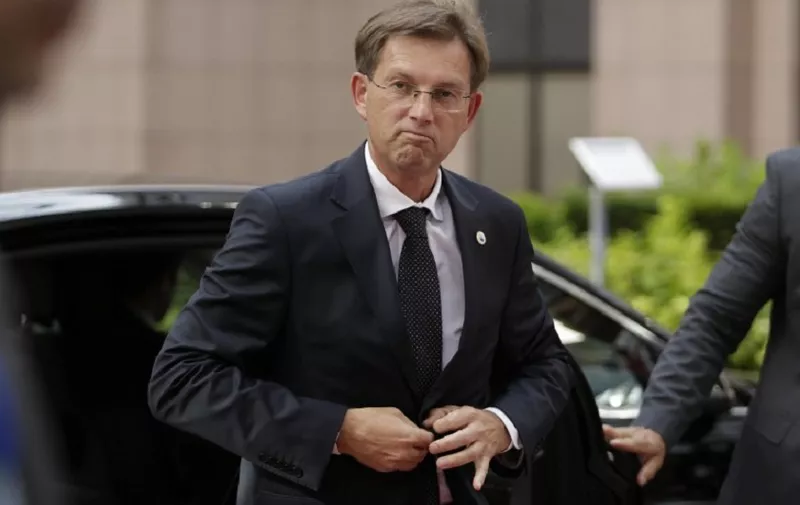 Slovenian Prime Minister Miro Cerar arrives at the European Union (EU) headquarters in Brussels on July 7, 2015 for an emergency EU summit after Greeks defiantly voted 'No' to further austerity. The Greek prime minister is to face his 18 eurozone counterparts as the country's economy gasps for air, with banks closed until at least July 9 amid fears the Greek financial system is imploding.  AFP PHOTO / KENZO TRIBOUILLARD