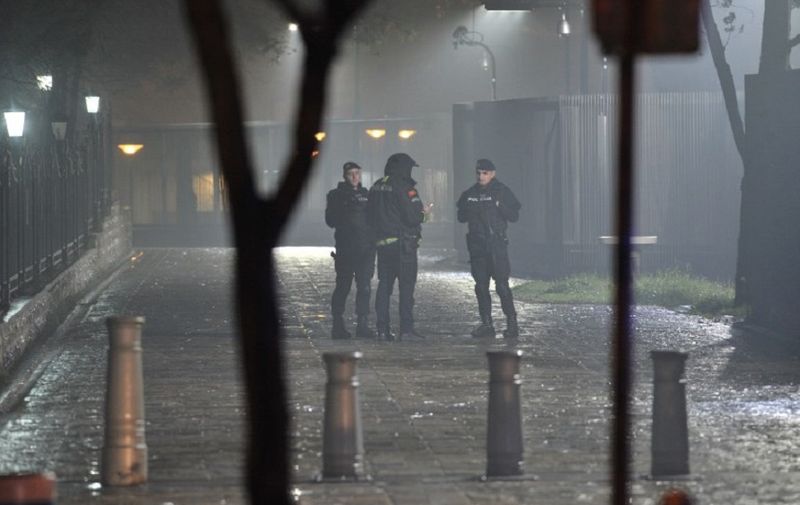 Police block off the area around the US Embassy in Montenegro's capital Podgorica on February 22, 2018.
An unknown attacker blew themself up after throwing a suspected grenade into the embassy compound in Podgorica, the Montenegrin government said Thursday. "In front of the @USEmbassyMNE building in #Podgorica, #Montenegro an unknown person committed suicide with an explosive device. Immediately before, that person threw an explosive device," the official government account tweeted, adding that the device was "most probably" a hand grenade.
 / AFP PHOTO / AFP-Services / SAVO PRELEVIC