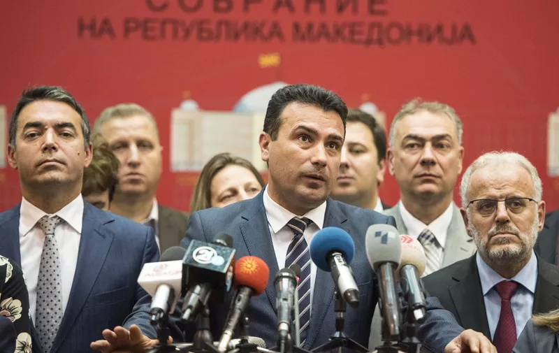 Macedonian Prime Minister Zoran Zaev gives a press conference in the Macedonian Parliament, in Skopje on October 19, 2018. - Macedonia's parliament on October 19, 2018 voted to start drafting constitutional amendments to rename the country North Macedonia, a major step towards breaking a decades-long stalemate with Greece. Eighty MPs in the 120-member assembly voted in favour of the motion, according to an AFP reporter in parliament, providing the necessary two-thirds supermajority to kickstart the process. (Photo by Robert ATANASOVSKI / AFP)