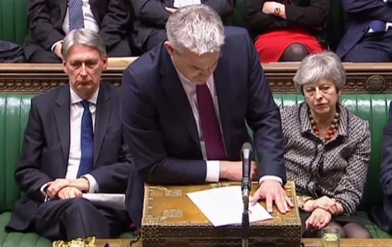 A video grab from footage broadcast by the UK Parliament's Parliamentary Recording Unit (PRU) shows Britain's Chancellor of the Exchequer Philip Hammond (L) and Britain's Prime Minister Theresa May listen as Britain's Secretary of State for Exiting the European Union (Brexit Minister) Stephen Barclay speaks in the House of Commons in London on April 1, 2019, following the outcome of the second round of indicative votes on the alternative options for Brexit. - British MPs voted against four possible alternative plans for Brexit on Monday after also rejecting the government's deal with the EU three times. Proposed alternatives for retaining much closer economic ties after Brexit, holding a second referendum or stopping Brexit to prevent a no-deal departure all failed to win a majority of votes in parliament. (Photo by - / various sources / AFP) / RESTRICTED TO EDITORIAL USE - MANDATORY CREDIT " AFP PHOTO / PRU " - NO USE FOR ENTERTAINMENT, SATIRICAL, MARKETING OR ADVERTISING CAMPAIGNS