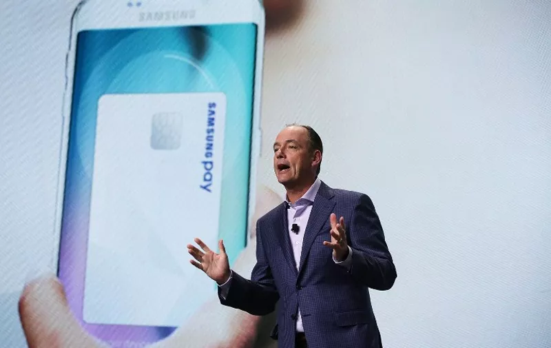 LAS VEGAS, NV - JANUARY 05: President and COO of Samsung Electronics America Tim Baxter discusses Samsung Pay, a mobile payment service, during a press event for CES 2016 at the Mandalay Bay Convention Center on January 5, 2016 in Las Vegas, Nevada. CES, the world's largest annual consumer technology trade show, runs from January 6-9 and is expected to feature 3,600 exhibitors showing off their latest products and services to more than 150,000 attendees.   Alex Wong/Getty Images/AFP