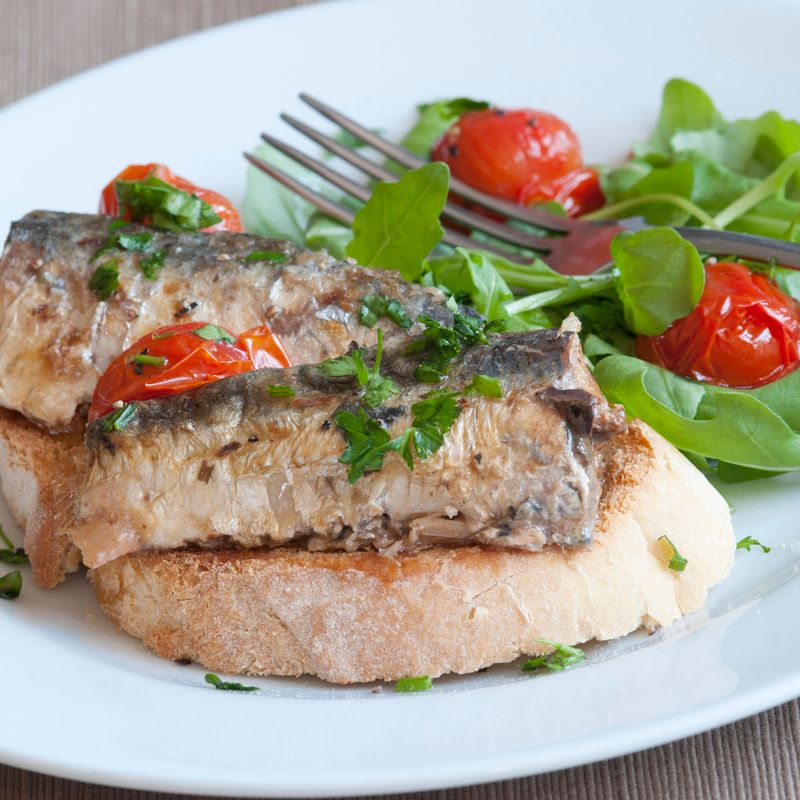 Grilled sardines on toast with side salad