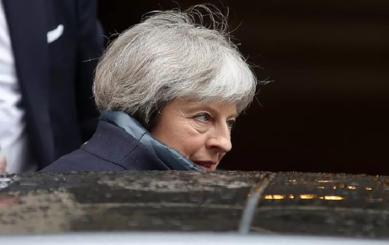 Britain's Prime Minister Theresa May leaves from 10 Downing Street to attend the weekly Prime Minister Questions (PMQs) session in the House of Commons in London on March 7, 2018.
British Prime Minister Theresa May will "raise deep concerns at the humanitarian situation" in war-torn Yemen with Saudi Crown Prince Mohammed bin Salman during his visit to Britain beginning Wednesday, according to her spokesman. / AFP PHOTO / Daniel LEAL-OLIVAS