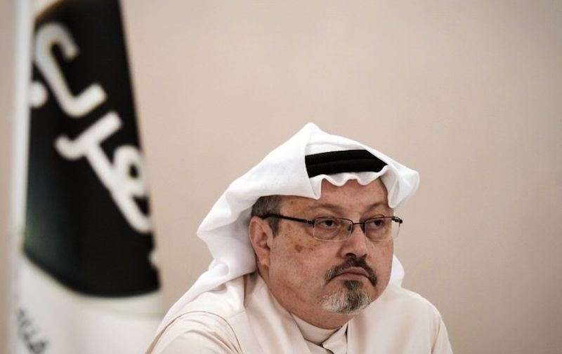(FILES) In this file photo taken on December 15, 2014, general manager of Alarab TV, Jamal Khashoggi, looks on during a press conference in the Bahraini capital Manama. - US President Donald Trump said October 11, 2018 he was not yet prepared to limit arms sales to Saudi Arabia over journalist Jamal Khashoggi's disappearance, but he faced mounting pressure from concerned American lawmakers. Saudi Arabia is one of the world's largest arms purchasers, with most of them coming from the United States.Khashoggi, a contributor to The Washington Post, vanished more than a week ago during a visit to the Saudi consulate in Istanbul. Turkish government sources say he was murdered there, a claim Riyadh denies. (Photo by MOHAMMED AL-SHAIKH / AFP)