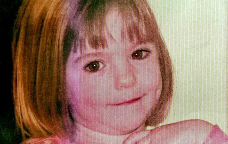An undated handout picture shows three-year old British girl Madeleine McCann who went missing at the Ocean club apartment hotel in Praia de Luz is pictured in Lagos. A team of three British police detectives arrived in Portugal 05 May 2007 to help track down a suspected kidnapper believed to have abducted a British toddler. 
   AFP PHOTO/ HANDOUT (Photo by AFP)
