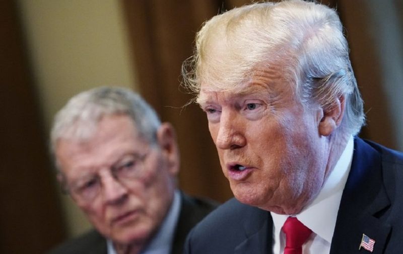 US President Donald Trump speaks during a meeting with Republican members of Congress and Cabinet members in the Cabinet Room of the White House on June 20, 2018 in Washington, DC. At left is Senator Jim Inhofe, R-OK.
Trump said he would sign an executive order to keep migrant families together at the border with Mexico, amid an escalating uproar over the separation of children from their parents. / AFP PHOTO / Mandel Ngan
