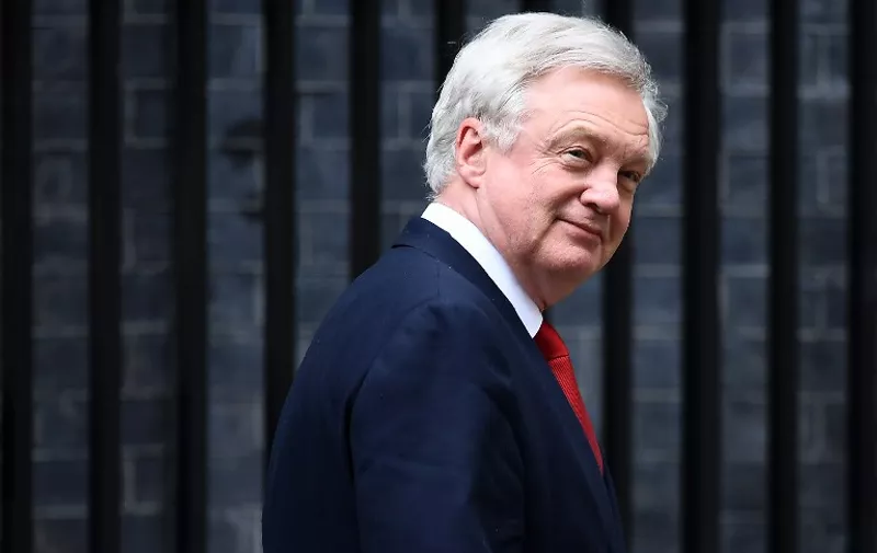Britain's Secretary of State for Exiting the European Union (Brexit Minister) David Davis reacts as he leaves Downing Street in central London on May 3, 2017 / AFP PHOTO / Justin TALLIS
