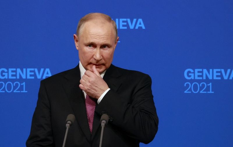 Russia's President Vladimir Putin holds a press conference after meeting with US President in Geneva on June 16, 2021. (Photo by DENIS BALIBOUSE / POOL / AFP)