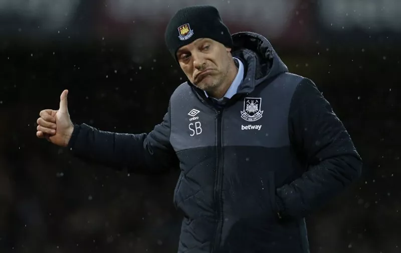 West Ham United's Croatian manager Slaven Bilic gestures during the English Premier League football match between West Ham United and Tottenham Hotpsur at The Boleyn Ground in Upton Park, in east London on March 2, 2016. / AFP / IAN KINGTON / RESTRICTED TO EDITORIAL USE. No use with unauthorized audio, video, data, fixture lists, club/league logos or 'live' services. Online in-match use limited to 75 images, no video emulation. No use in betting, games or single club/league/player publications.  /