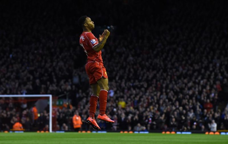 Liverpool's English midfielder Raheem Sterling celebrates after scoring the opening goal of the English Premier League football match between Liverpool and Newcastle United at Anfield in Liverpool, north west England on April 13, 2015. AFP PHOTO / 

RESTRICTED TO EDITORIAL USE. NO USE WITH UNAUTHORIZED AUDIO, VIDEO, DATA, FIXTURE LISTS, CLUB/LEAGUE LOGOS OR LIVE SERVICES. ONLINE IN-MATCH USE LIMITED TO 45 IMAGES, NO VIDEO EMULATION. NO USE IN BETTING, GAMES OR SINGLE CLUB/LEAGUE/PLAYER PUBLICATIONS.