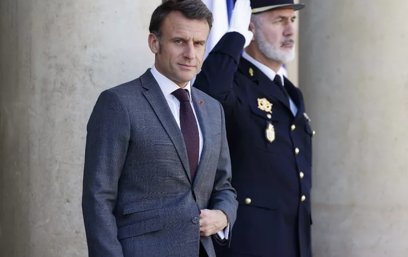 France's President Emmanuel Macron waits for the arrival of Albania's Prime Minister prior to a working lunch at the presidential Elysee Palace, in Paris on April 12, 2024. (Photo by Ludovic MARIN / AFP)