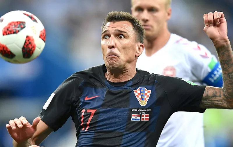 5572311 01.07.2018 Croatia&#8217;s Mario Mandzukic controls a ball during extra time of the game at the World Cup Round of 16 soccer match between Croatia and Denmark at the Nizhny Novgorod stadium, in Nizhny Novgorod, Russia, July 1, 2018., Image: 376609140, License: Rights-managed, Restrictions: , Model Release: no, Credit line: Profimedia, Sputnik