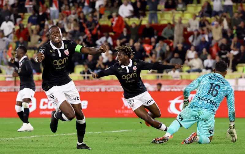 Soccer Football - Ligue 1 - AS Monaco v Montpellier - Stade Louis II, Monaco - September 28, 2024 AS Monaco's Denis Zakaria celebrates after Lamine Camara scores their second goal REUTERS/Manon Cruz
