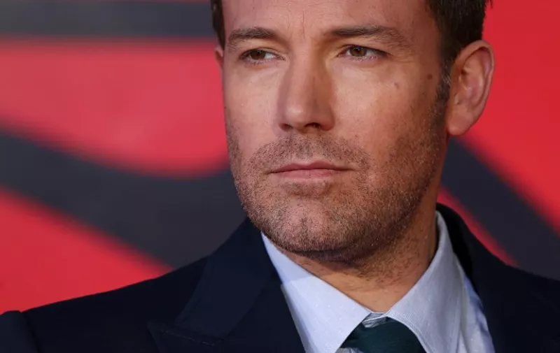 US actor Ben Affleck poses for a photograph after arriving to attend the European Premiere of the film "Batman v Superman: Dawn of Justice", in central London on March 22, 2016.  / AFP PHOTO / JUSTIN TALLIS