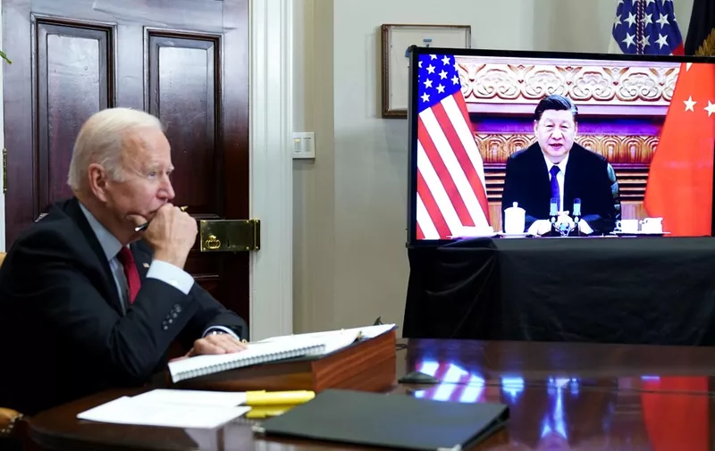 US President Joe Biden meets with China's President Xi Jinping during a virtual summit from the Roosevelt Room of the White House in Washington, DC, November 15, 2021. (Photo by MANDEL NGAN / AFP)