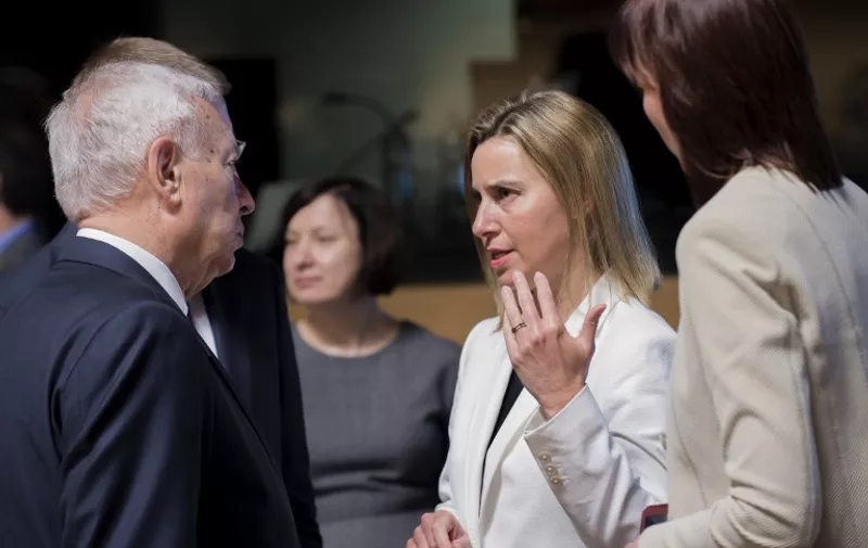 Spanish Foreign minister Jose Manuel Garcia Margallo (L) talks with High Representative of the Union for Foreign Affairs and Security Policy and Vice-President of the Commission, Federica Mogherini (C) before an emergency meeting of foreign and interior ministers following the weekend loss of a ship with some 700 migrants on board in Luxembourg on April [&hellip;]