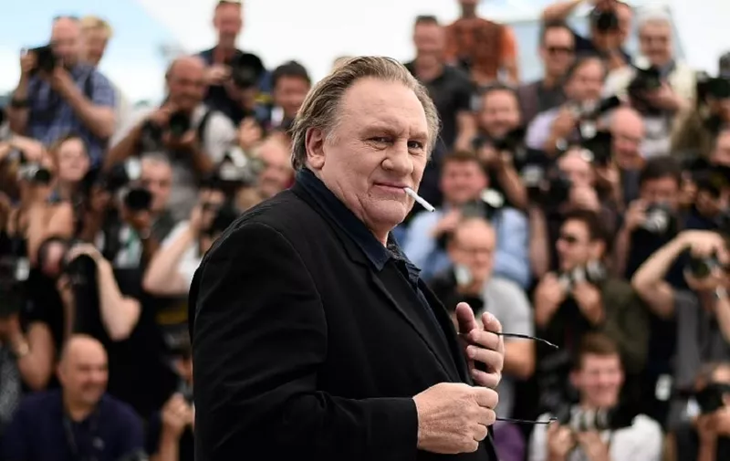 (FILES) In this file photo taken on May 22, 2015, French actor Gerard Depardieu poses during a photocall for the film "Valley of Love" at the 68th Cannes Film Festival in Cannes, southeastern France.
According to judicial source on August 30, 2018, French actor Gerard Depardieu faces probe over alleged rape and sex assaults. / AFP PHOTO / LOIC VENANCE