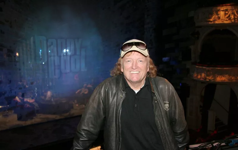 German music producer Frank Farian smiles in the auditorium of the Shaftesbury Theatre in London, UK, 14 September 2006. The theatre is the venue for the world premiere of Farian's 5 million euro musical porduction 'Daddy Cool', the musical about the pop group 'Boney M.' invented by Farian. All beloved and maligned smash hits from 'Mary's Boy Child' to 'Ma Baker' will be heared again 30 years after their first No.1 hit. Photo: Dominik Laux (Photo by DB Dominik Laux / DPA / dpa Picture-Alliance via AFP)