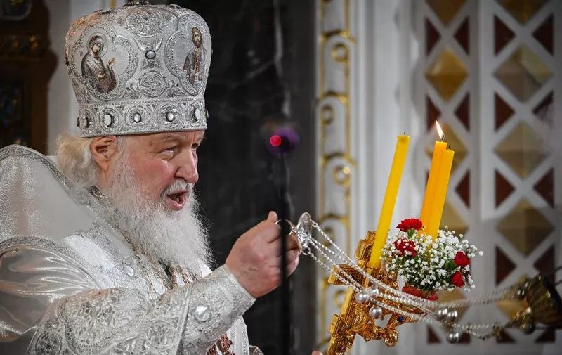 Russian Orthodox Patriarch Kirill serves during an Orthodox Easter service, late on April 23, 2022 in Moscow. (Photo by Alexander NEMENOV / AFP)