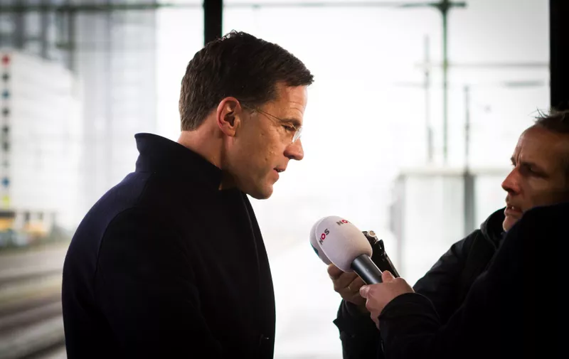 LEIDEN, THE NETHERLANDS - MARCH 8: Dutch Prime Minister and leader of the People's Party for Freedom and Democracy Mark Rutte (R) speaks to a Dutch Television before he takes a train while campaigning for re-election, in Leiden, The Netherlands on March 8, 2017. The Dutch general election is set to take place on March 15, 2017. Paco Nunez / Anadolu Agency, Image: 324422447, License: Rights-managed, Restrictions: , Model Release: no, Credit line: Profimedia, Abaca