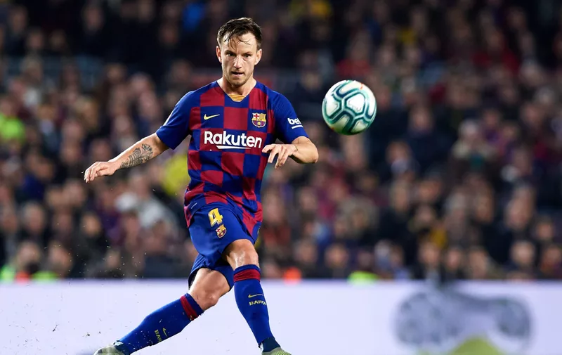 BARCELONA, SPAIN - DECEMBER 18: Ivan Rakitic of FC Barcelona plays the ball during the Liga match between FC Barcelona and Real Madrid CF at Camp Nou on December 18, 2019 in Barcelona, Spain. (Photo by Alex Caparros/Getty Images)