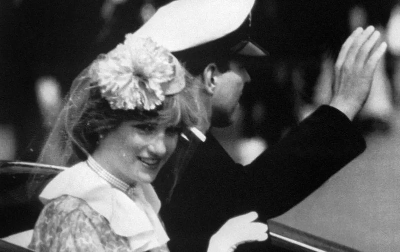 Princess Diana, Prince Charles's fiancee and Prince Andrew wave on June 13, 1981 during the Trooping the Colour parade, in London. (Photo by AFP)