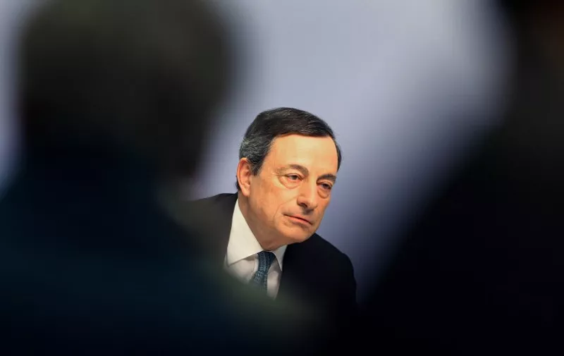 Mario Draghi, President of the European Central Bank (ECB), addresses the media during a press conference following the meeting of the Governing Council in Frankfurt am Main, western Germany, on March 10, 2016.
The European Central Bank cut all three of its key interest rates and beefed up its controversial asset purchase programme in a bid to kickstart chronically low inflation in the euro area. / AFP PHOTO / DANIEL ROLAND