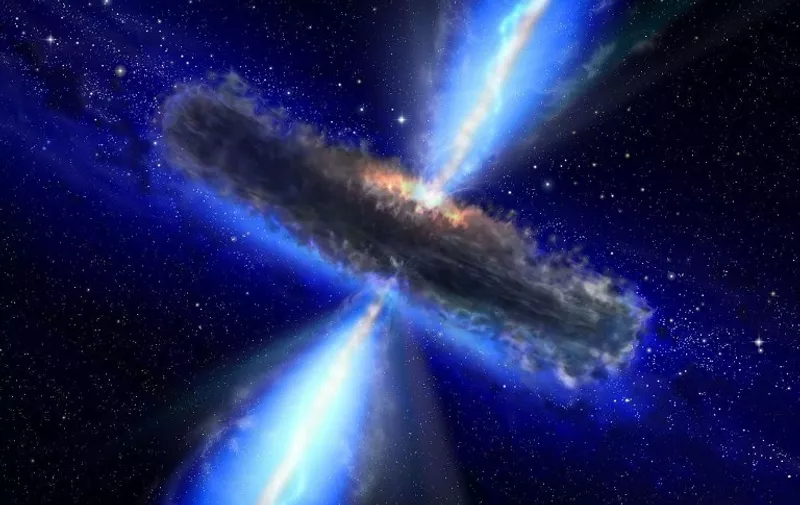 (FILES) This file photo taken on March 13, 2012 shows an artist's concept illustrates a quasar, or feeding black hole. 
Scientists are set to make a major announcement February 10, 2016 on efforts to pinpoint the existence of gravitational waves, or ripples of space and time that transport energy across the universe. The waves themselves have never before been directly measured, though Albert Einstein said a century ago they were out there, according to his theory of general relativity. They are believed to form around massive objects like black holes and neutron stars, warping space and time.
 / AFP / NASA / Handout / RESTRICTED TO EDITORIAL USE - MANDATORY CREDIT "AFP PHOTO / NASA/ESA" - NO MARKETING NO ADVERTISING CAMPAIGNS - DISTRIBUTED AS A SERVICE TO CLIENTS