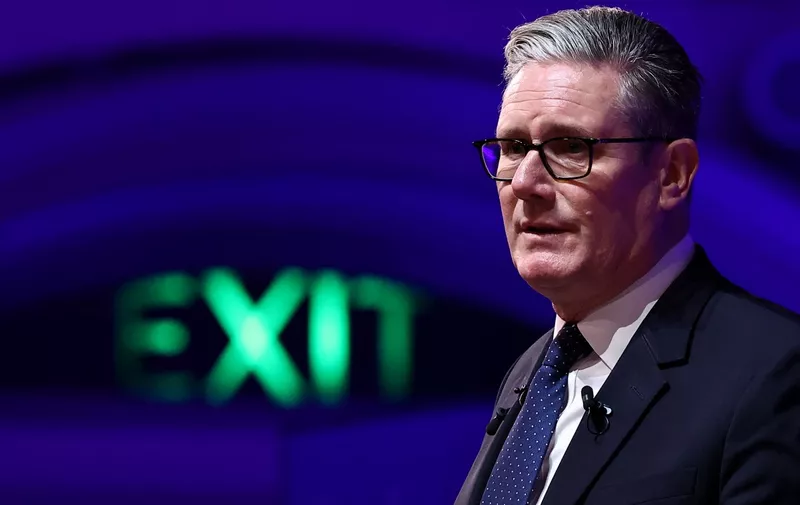 Britain's Prime Minister Keir Starmer delivers a speech during the 2025 Global Progress Action Summit in central London on September 26, 2025. The meeting in London is expected to include world leaders including Australian Prime Minister Anthony Albanese and Canadian premier Mark Carney. (Photo by HENRY NICHOLLS / AFP)
