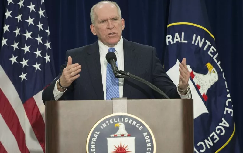 Director of Central Intelligence Agency John Brennan takes questions from reporters during a press conference at CIA headquarters in Langley, Virginia, December 11, 2014.   The head of the Central Intelligence Agency acknowledged Thursday some agency interrogators used "abhorrent" unauthorized techniques in questioning terrorism suspects after the 9/11 attacks. CIA director John Brennan said there was no way to determine whether the methods used produced useful intelligence, but he strongly denied the CIA misled the public. AFP PHOTO/JIM WATSON