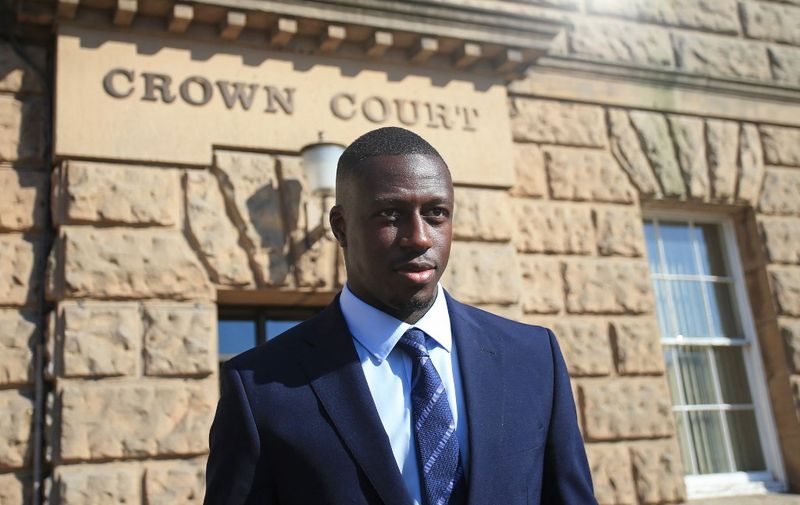 Manchester City and France footballer Benjamin Mendy leaves Chester Crown Court in north-west England on August 10, 2022 at the start of his trial for the alleged rape and assault of seven women. - Mendy, 28, who faces eight counts of rape, one count of sexual assault and one count of attempted rape, relating to seven young women, could see his playing career end in jail if convicted. (Photo by Lindsey Parnaby / AFP)