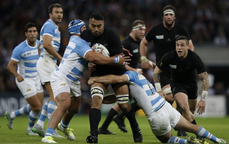 New Zealand's number 8 Victor Vito (C) is tackled during a Pool C match of the 2015 Rugby World Cup between New Zealand and Argentina at Wembley stadium, north London on September 20, 2015.  AFP PHOTO / ADRIAN DENNIS

RESTRICTED TO EDITORIAL USE, NO USE IN LIVE MATCH TRACKING SERVICES, TO BE USED AS NON-SEQUENTIAL STILLS