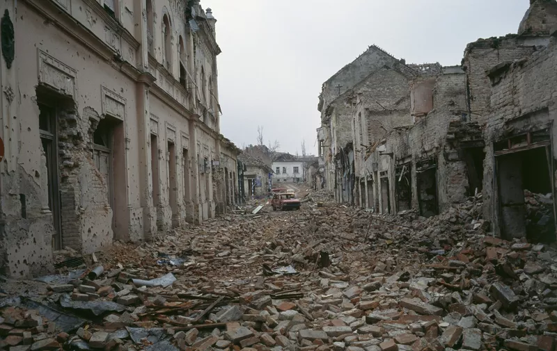 Bombed buildings are riddled with bullet holes and streets are filled with rubble after a three-month battle between the Croatian armed forces and the Yugoslavian Federal Army in Vukovar. The Yugoslavian Federal Army completely destroyed the Croatian city and killed thousands of civilians., Image: 15114616, License: Rights-managed, Restrictions: Content available for editorial use, pre-approval required for all other uses.
This content may not be materially modified or used in composite content., Model Release: no, Credit line: Profimedia, Corbis