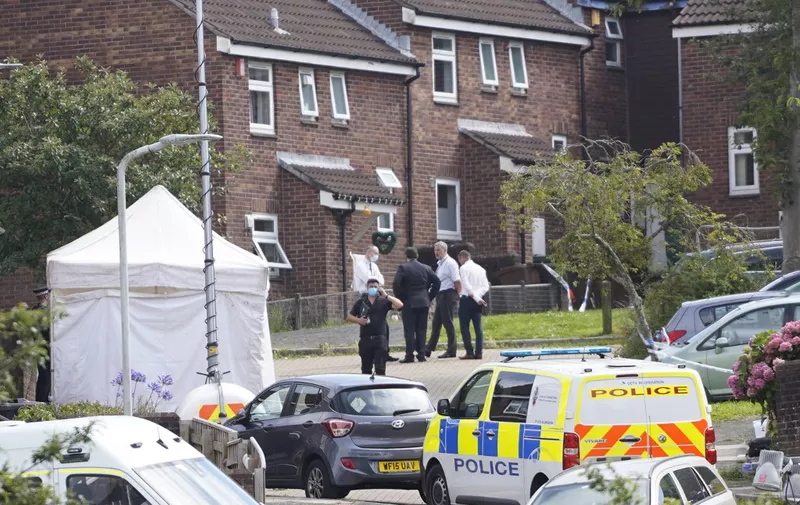 Police officers work at the scene of a shooting incident in Plymouth, southwest England, on August 13, 2021. - British police said August 13 they were investigating the background of a troubled loner who obtained a firearms licence and shot dead five people including a three-year-old girl in the country's first mass shooting in 11 years. (Photo by Niklas HALLE'N / AFP)